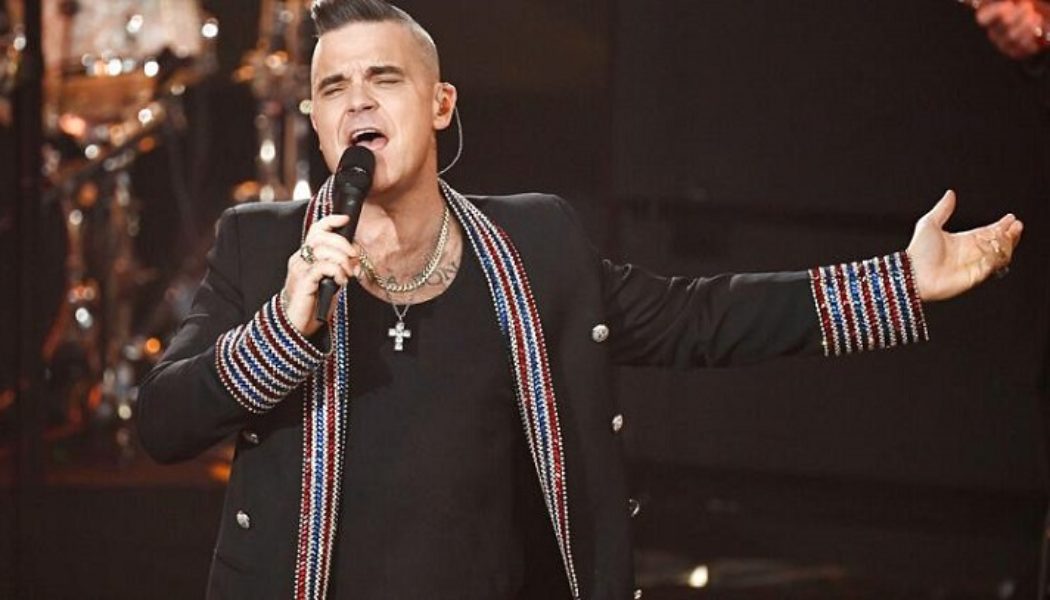 „Holy Shit“: Robbie Williams und die PizzaGate-Verschwörungstheorie 